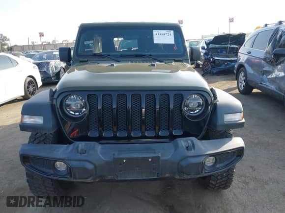 2022 Jeep Wrangler Unlimited High Tide z VIN 1C4HJXDG5NW113205, wystawiony jako IAAI lot #41488724 z przebiegiem 30 446 mil mil oraz . Historia ofert i sprzedaży dostępna na DreamBid. Obrazek 13.