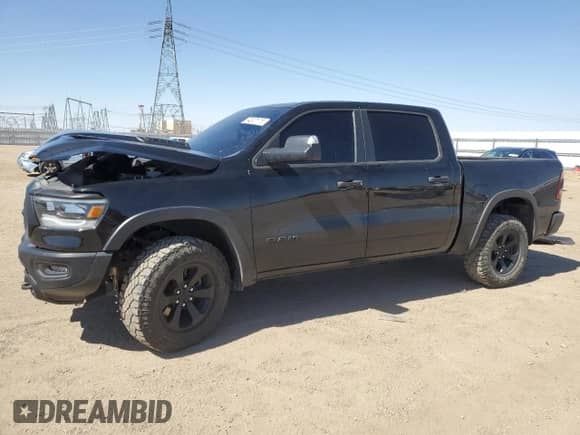 2023 Ram 1500 Rebel z VIN 1C6SRFLT2PN673853, wystawiony jako Copart lot #64507175 z przebiegiem 43 462 mil mil oraz Szkoda całkowita • Salvage title. Historia ofert i sprzedaży dostępna na DreamBid. Obrazek 1.