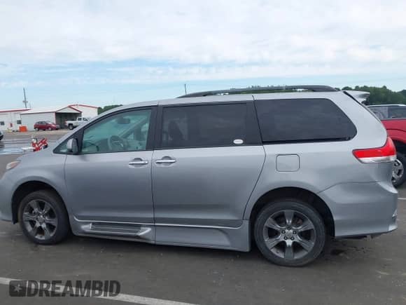 2014 Toyota Sienna SE with VIN 5TDXK3DC6ES421515, listed as a IAAI auction lot 43102179 with 63,756 mi miles and . Bid and sale history available at DreamBid. Image 14.