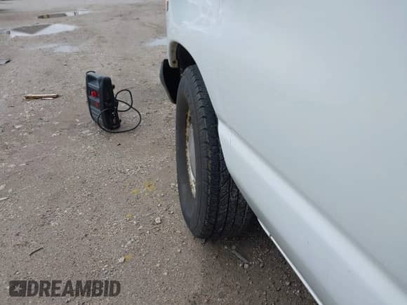 2000 Ford Econoline Cargo with VIN 1FTRE14W2YHB25933, listed as a IAAI auction lot 41912248 with 57,561 mi miles and . Bid and sale history available at DreamBid. Image 13.