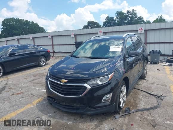 2020 Chevrolet Equinox LT with VIN 2GNAXLEXXL6205724, listed as a IAAI auction lot 42887380 with 100,560 mi miles and . Bid and sale history available at DreamBid. Image 2.
