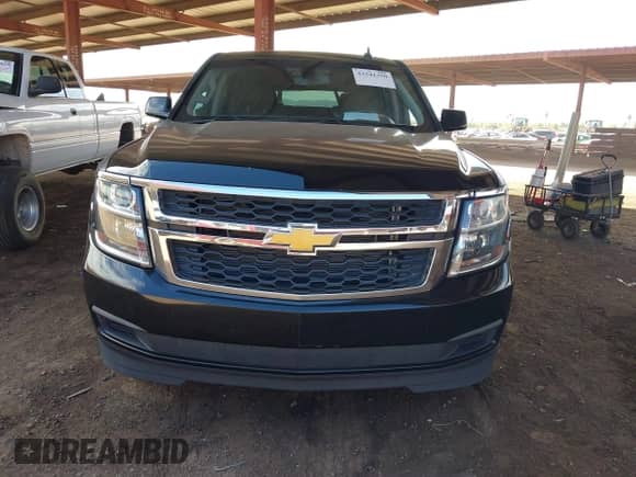 2015 Chevrolet Tahoe LS with VIN 1GNSCAKC0FR711917, listed as a IAAI auction lot 43241350 with 181,124 mi miles and . Bid and sale history available at DreamBid. Image 12.