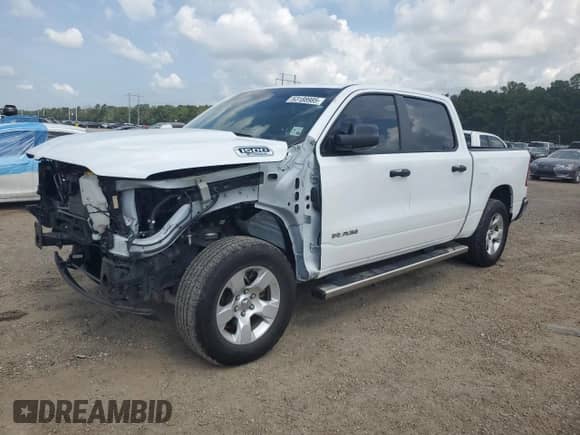 2024 Ram 1500 Big Horn with VIN 1C6RREFGXRN152146, listed as a Copart auction lot 63188985 with 39,679 mi miles and Salvage title. Bid and sale history available at DreamBid. Image 1.