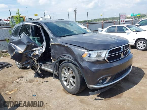 2016 Dodge Durango SXT with VIN 1C4RDJAG5GC393418, listed as a IAAI auction lot 43206789 with 153,703 mi miles and . Bid and sale history available at DreamBid. Image 1.