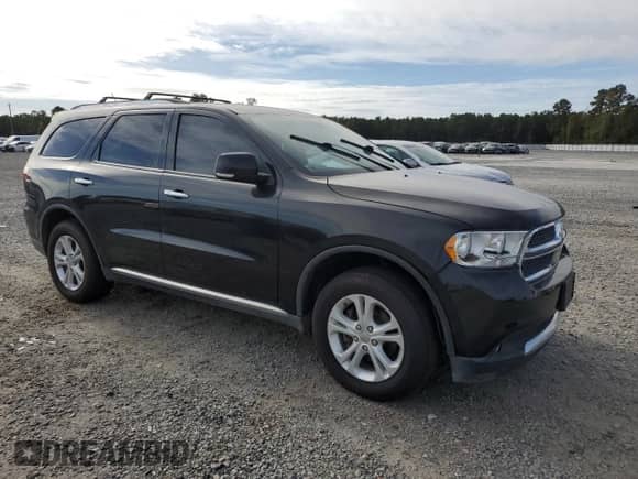 2013 Dodge Durango Crew with VIN 1C4RDJDG8DC613528, listed as a Copart auction lot 85516385 with 206,328 mi miles and Clean title. Bid and sale history available at DreamBid. Image 4.