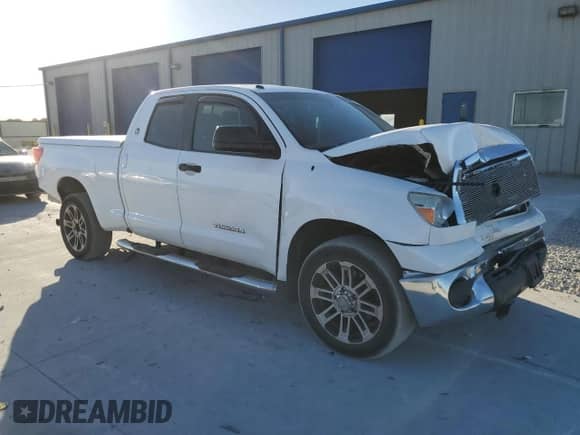2012 Toyota Tundra z VIN 5TFRM5F13CX040352, wystawiony jako Copart lot #82679795 z przebiegiem 131 423 mil mil oraz Szkoda całkowita • Salvage title. Historia ofert i sprzedaży dostępna na DreamBid. Obrazek 4.