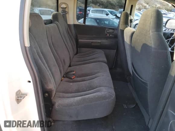 2003 Dodge Dakota с VIN 1D7HG48Z53S314833, выставлен на аукционе Copart как лот 79142254 с пробегом 131 044 миль миль и Списание • Salvage title. История ставок и продаж доступна на DreamBid. Изображение 10.