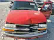 2000 Chevrolet Blazer LS with VIN 1GNDT13W5Y2280679, listed as a Copart auction lot 64712735 with Not provided miles and Salvage title. Bid and sale history available at DreamBid. Image 12.