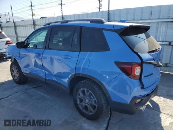 2024 Honda Passport TrailSport with VIN 5FNYF8H69RB012767, listed as a Copart auction lot 80013555 with 3,522 mi miles and Salvage title. Bid and sale history available at DreamBid. Image 2.