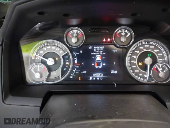 2015 Ram 1500 Laramie Limited with VIN 1C6RR7PT5FS552426, listed as a IAAI auction lot 42039997 with 167,944 mi miles and . Bid and sale history available at DreamBid. Image 7.