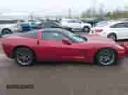 2006 Chevrolet Corvette z VIN 1G1YY26U065107054, wystawiony jako IAAI lot #41951460 z przebiegiem 60 596 mil mil oraz . Historia ofert i sprzedaży dostępna na DreamBid. Obrazek 14.