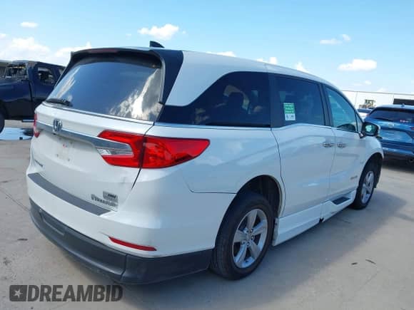 2020 Honda Odyssey EX-L with VIN 5FNRL6H77LB021095, listed as a IAAI auction lot 42581910 with 50,608 mi miles and . Bid and sale history available at DreamBid. Image 4.