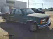 1998 GMC Sierra 1500 z VIN 2GTEC19M9W1555549, wystawiony jako Copart lot #85330205 z przebiegiem 92 604 mil mil oraz Czysty tytuł • Clean title. Historia ofert i sprzedaży dostępna na DreamBid. Obrazek 4.