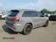 2020 Jeep Grand Cherokee SRT with VIN 1C4RJFDJ8LC158048, listed as a Copart auction lot 57426205 with 52,979 mi miles and Salvage title. Bid and sale history available at DreamBid. Image 3.