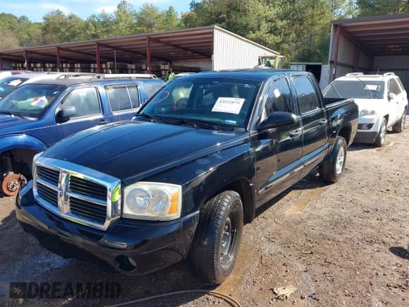 2005 Dodge Dakota SLT с VIN 1D7HE48K15S184545, выставлен на аукционе IAAI как лот 43512074 с пробегом 200 390 миль миль и . История ставок и продаж доступна на DreamBid. Изображение 2.