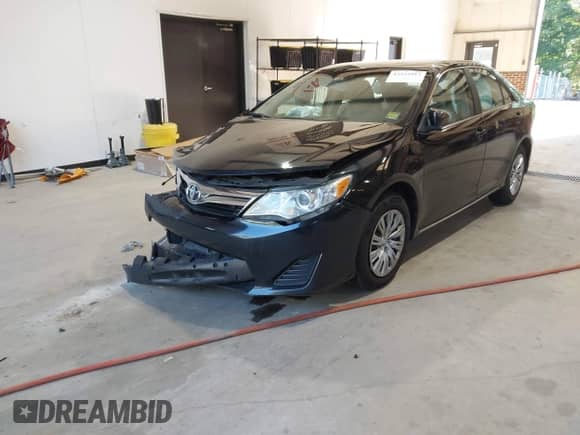 2012 Toyota Camry L with VIN 4T1BF1FK7CU031079, listed as a IAAI auction lot 43233913 with 186,276 mi miles and . Bid and sale history available at DreamBid. Image 2.