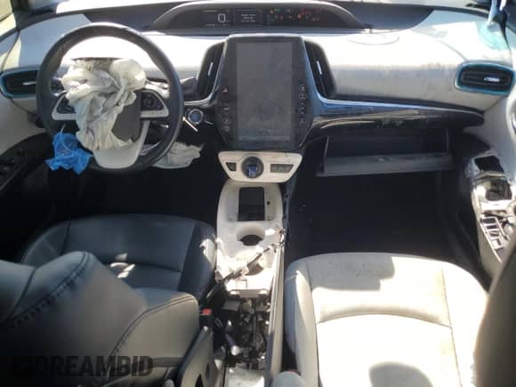 2018 Toyota Prius Plus с VIN JTDKARFP3J3071952, выставлен на аукционе Copart как лот 86668035 с пробегом 106 993 миль миль и Списание • Salvage title. История ставок и продаж доступна на DreamBid. Изображение 8.