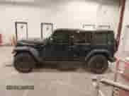 2024 Jeep Wrangler Sport S with VIN 1C4PJXDG4RW218996, listed as a IAAI auction lot 42088856 with 10,717 mi miles and . Bid and sale history available at DreamBid. Image 14.