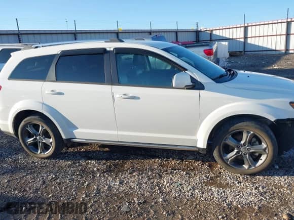 2015 Dodge Journey Crossroad with VIN 3C4PDCGG5FT639266, listed as a IAAI auction lot 41108296 with 126,376 mi miles and . Bid and sale history available at DreamBid. Image 13.