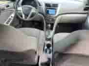 2014 Hyundai Accent GLS z VIN KMHCT4AE5EU703823, wystawiony jako Copart lot #86420595 z przebiegiem 132 910 mil mil oraz Szkoda całkowita • Salvage title. Historia ofert i sprzedaży dostępna na DreamBid. Obrazek 8.