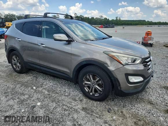 2015 Hyundai Santa Fe z VIN 5XYZUDLB1FG294690, wystawiony jako Copart lot #65039015 z przebiegiem 144 835 mil mil oraz Szkoda całkowita • Salvage title. Historia ofert i sprzedaży dostępna na DreamBid. Obrazek 4.