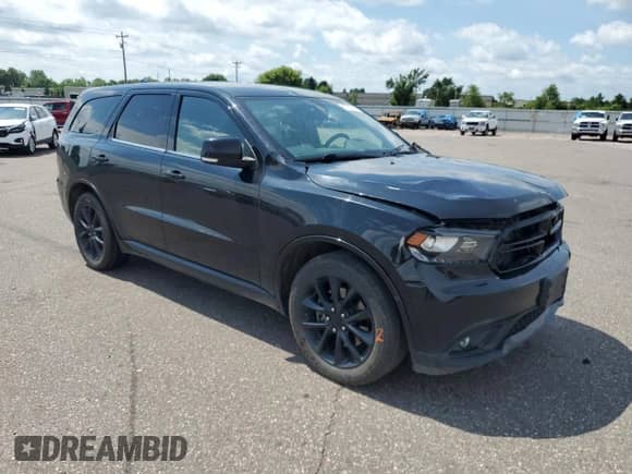 2017 Dodge Durango R/T z VIN 1C4SDJCT1HC666299, wystawiony jako Copart lot #65757765 z przebiegiem 169 502 mil mil oraz Szkoda całkowita • Salvage title. Historia ofert i sprzedaży dostępna na DreamBid. Obrazek 4.