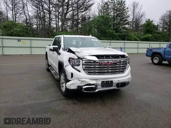 2023 GMC Sierra 1500 Denali z VIN 1GTUUGED3PZ109844, wystawiony jako Copart lot #59780445 z przebiegiem 32 409 mil mil oraz Szkoda całkowita • Salvage title. Historia ofert i sprzedaży dostępna na DreamBid. Obrazek 13.