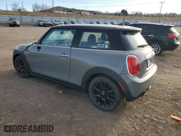 2015 MINI Hardtop with VIN WMWXM5C50FT937233, listed as a Copart auction lot 50077295 with 87,785 mi miles and Salvage title. Bid and sale history available at DreamBid. Image 2.