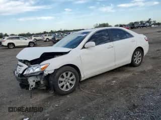 2009 Toyota Camry LE with VIN 4T1BK46K19U583702, listed as a Copart auction lot 84543595 with 147,768 mi miles and Clean title. Bid and sale history available at DreamBid. Image 1.