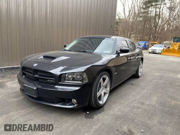 2008 Dodge Charger SRT-8 с VIN 2B3LA73W08H150301, выставлен на аукционе Copart как лот 75657624 с пробегом 152 591 миль миль и Чистый • Clean title. История ставок и продаж доступна на DreamBid. Изображение 2.
