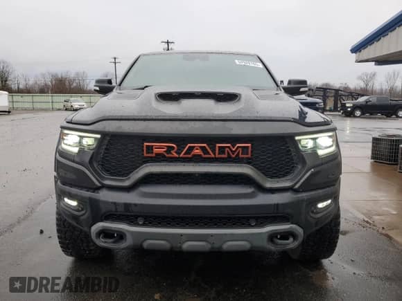 2021 Ram 1500 TRX с VIN 1C6SRFU99MN758770, выставлен на аукционе Copart как лот 52928765 с пробегом 59 155 миль миль и Списание • Salvage title. История ставок и продаж доступна на DreamBid. Изображение 5.
