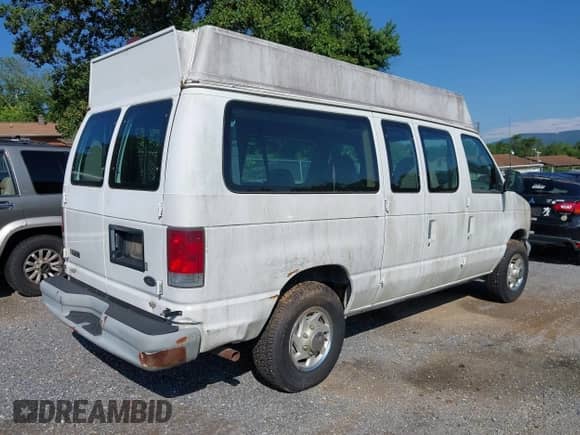2002 Ford Econoline Cargo with VIN 1FTNE242X2HA90857, listed as a IAAI auction lot 42716391 with 103,796 mi miles and . Bid and sale history available at DreamBid. Image 6.
