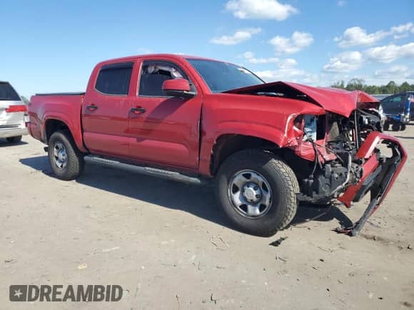 2020 Toyota Tacoma SR with VIN 3TMCZ5AN5LM353734, listed as a Copart auction lot 81958555 with 105,361 mi miles and Salvage title. Bid and sale history available at DreamBid. Image 4.