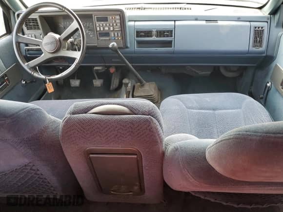 1991 GMC Sierra 1500 SLT z VIN 2GTEK19Z4M1542137, wystawiony jako Copart lot #68024074 z przebiegiem 347 281 mil mil oraz Szkoda całkowita • Salvage title. Historia ofert i sprzedaży dostępna na DreamBid. Obrazek 8.