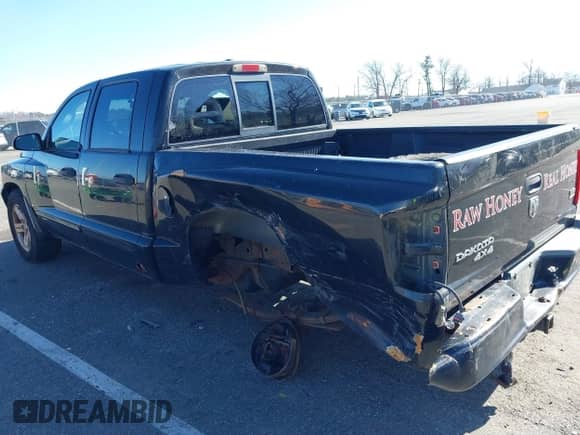 2007 Dodge Dakota SLT z VIN 1D7HW48JX7S196121, wystawiony jako IAAI lot #41863734 z przebiegiem 148 720 mil mil oraz . Historia ofert i sprzedaży dostępna na DreamBid. Obrazek 6.