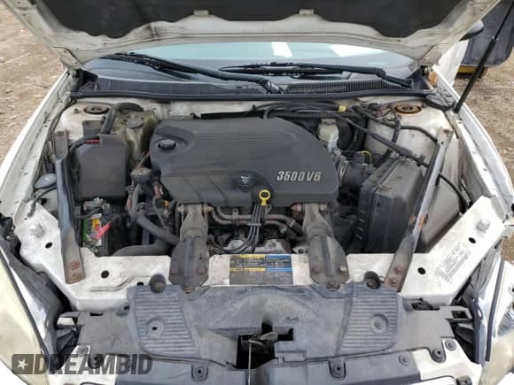 2007 Chevrolet Monte Carlo LS z VIN 2G1WJ15KX79108769, wystawiony jako Copart lot #51261795 z przebiegiem 150 465 mil mil oraz Szkoda całkowita • Salvage title. Historia ofert i sprzedaży dostępna na DreamBid. Obrazek 11.