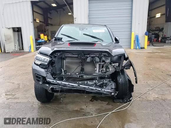 2022 Toyota Tacoma SR с VIN 3TYCZ5AN4NT102730, выставлен на аукционе Copart как лот 70374165 с пробегом 39 034 миль миль и Списание • Salvage title. История ставок и продаж доступна на DreamBid. Изображение 13.