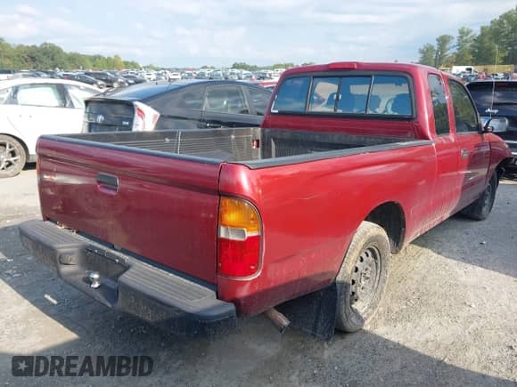 1995 Toyota Tacoma z VIN 4TAUN53B1SZ040515, wystawiony jako IAAI lot #43135152 z przebiegiem 259 900 mil mil oraz . Historia ofert i sprzedaży dostępna na DreamBid. Obrazek 4.
