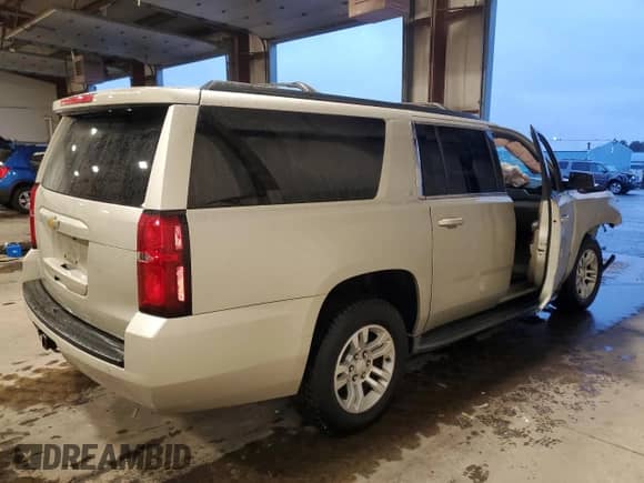 2015 Chevrolet Suburban с VIN 1GNSKHEC3FR144593, выставлен на аукционе Copart как лот 81894024 с пробегом 81 270 миль миль и Списание • Salvage title. История ставок и продаж доступна на DreamBid. Изображение 3.