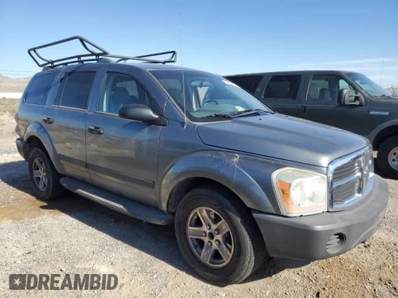 2006 Dodge Durango SXT with VIN 1D4HD38K16F128304, listed as a Copart auction lot 58182694 with 103,374 mi miles and Salvage title. Bid and sale history available at DreamBid. Image 4.