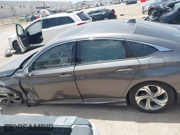 2018 Honda Accord EX-L with VIN 1HGCV1F54JA023057, listed as a IAAI auction lot 42850251 with 60,802 mi miles and . Bid and sale history available at DreamBid. Image 14.
