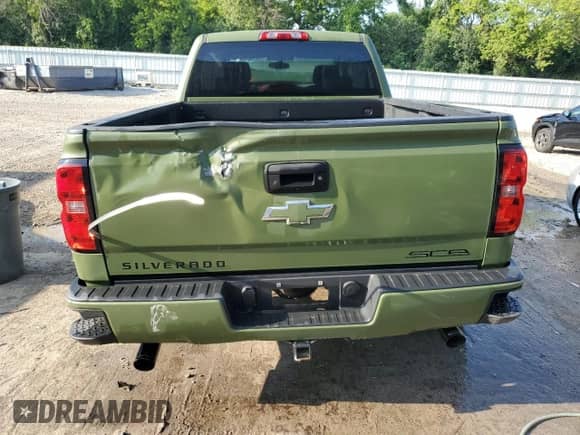 2018 Chevrolet Silverado 1500 LT z VIN 3GCUKREC6JG500373, wystawiony jako Copart lot #61946725 z przebiegiem Nie podano mil oraz Nie do naprawy • Non repairable. Historia ofert i sprzedaży dostępna na DreamBid. Obrazek 6.