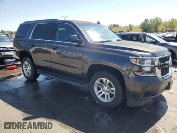 2015 Chevrolet Tahoe LS с VIN 1GNSCAECXFR641595, выставлен на аукционе Copart как лот 68126805 с пробегом 99 370 миль миль и Списание • Salvage title. История ставок и продаж доступна на DreamBid. Изображение 4.