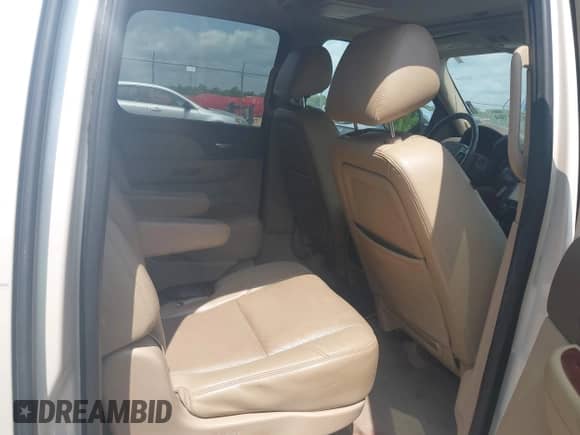 2013 Chevrolet Suburban LTZ with VIN 1GNSCKE0XDR322898, listed as a IAAI auction lot 42279704 with 213,429 mi miles and . Bid and sale history available at DreamBid. Image 8.