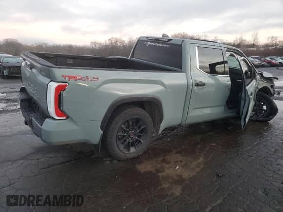 2023 Toyota Tundra Limited Hybrid with VIN 5TFJC5EC1PX002952, listed as a Copart auction lot 77979614 with Not provided miles and Salvage title. Bid and sale history available at DreamBid. Image 3.