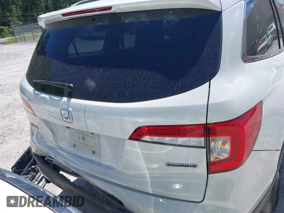 2021 Honda Pilot Touring 8-Passenger z VIN 5FNYF5H98MB037807, wystawiony jako IAAI lot #42136047 z przebiegiem 80 990 mil mil oraz . Historia ofert i sprzedaży dostępna na DreamBid. Obrazek 17.