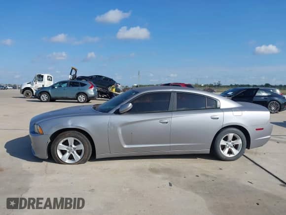 2014 Dodge Charger SE z VIN 2C3CDXBG9EH192983, wystawiony jako IAAI lot #43553133 z przebiegiem 124 512 mil mil oraz . Historia ofert i sprzedaży dostępna na DreamBid. Obrazek 13.