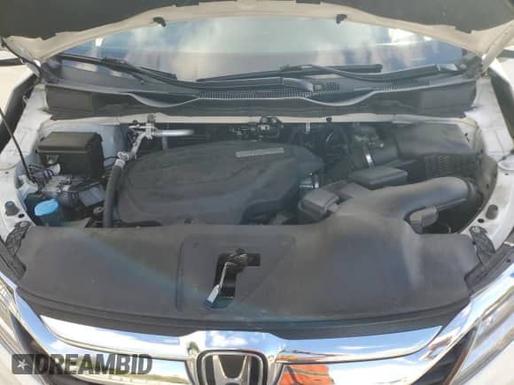 2019 Honda Odyssey Elite с VIN 5FNRL6H95KB100930, выставлен на аукционе Copart как лот 81932035 с пробегом 121 698 миль миль и Списание • Salvage title. История ставок и продаж доступна на DreamBid. Изображение 12.