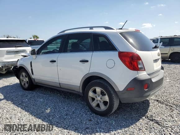 2014 Chevrolet Captiva Sport LS z VIN 3GNAL1EK0ES590395, wystawiony jako Copart lot #52445555 z przebiegiem 143 320 mil mil oraz Szkoda całkowita • Salvage title. Historia ofert i sprzedaży dostępna na DreamBid. Obrazek 2.