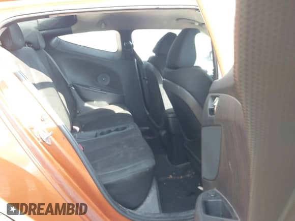 2012 Hyundai Veloster w/Red Int с VIN KMHTC6AD8CU065650, выставлен на аукционе IAAI как лот 43576272 с пробегом 147 621 миль миль и . История ставок и продаж доступна на DreamBid. Изображение 8.